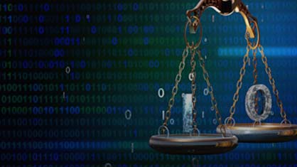 stylized photo of scales of justice over binary code