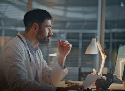 doctor on a computer