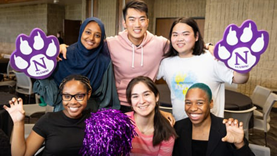 smiling group of Northwestern alums