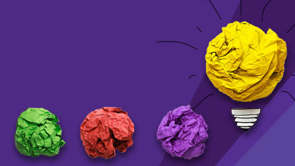 crumpled paper trail with yellow paper lightbulb