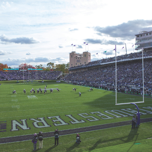 Northwestern University football stadium with a sea of purple in the stands.